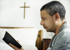 A man reading a bible